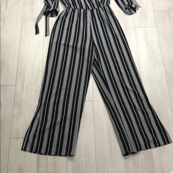 Striped jumpsuit with open sleeves - Picture 4 of 9